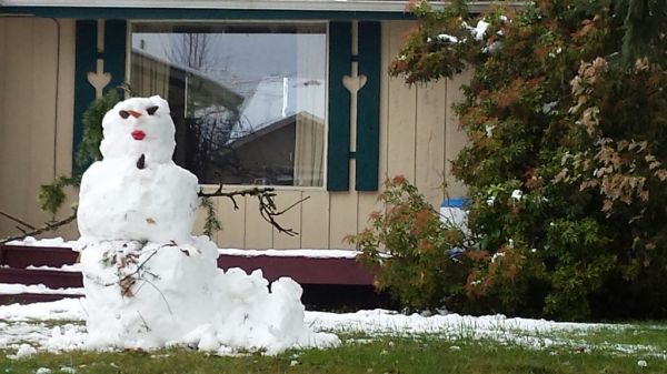 Happy anniversary to the Beatles, snowwoman, lipstick, brush hair, heart shaped shutters, Olympia, Washington, USA