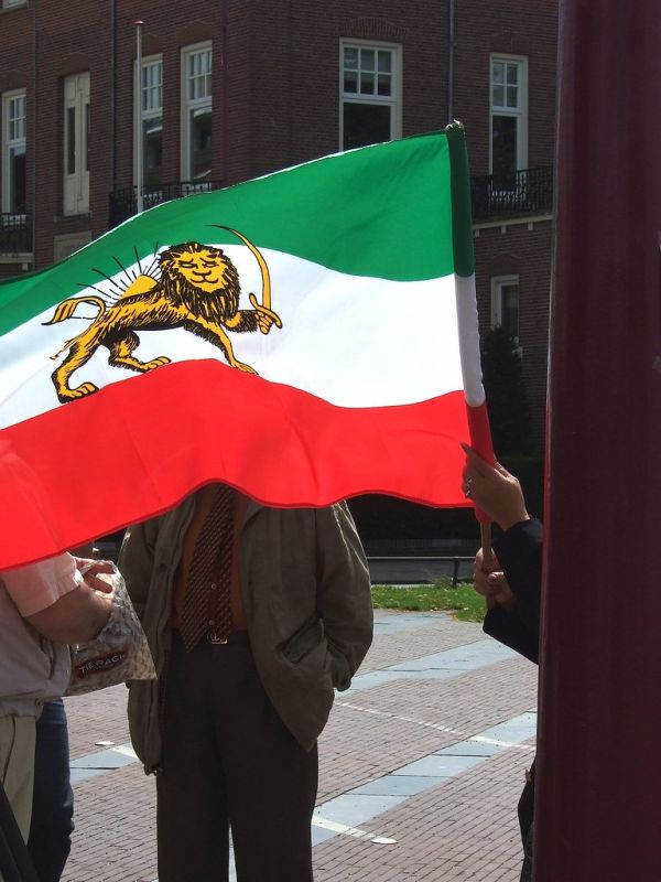 Iranian woman showing flag