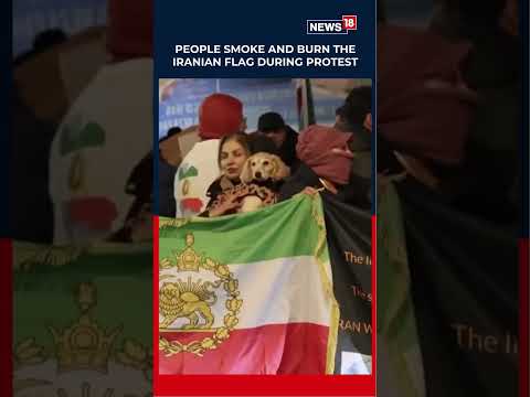 People Burn The Iranian Flag During A Pro-Reza Pahlavi Protest Outside Starmer’s Residence N18S