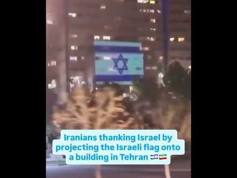 Iranians are thanking Israel by projecting the Israeli flag onto a building in Tehran