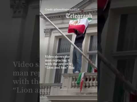Protester tears down Iranian regime flag from London embassy